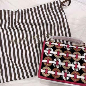 Brand New Henri Bendel bag with dust jacket.